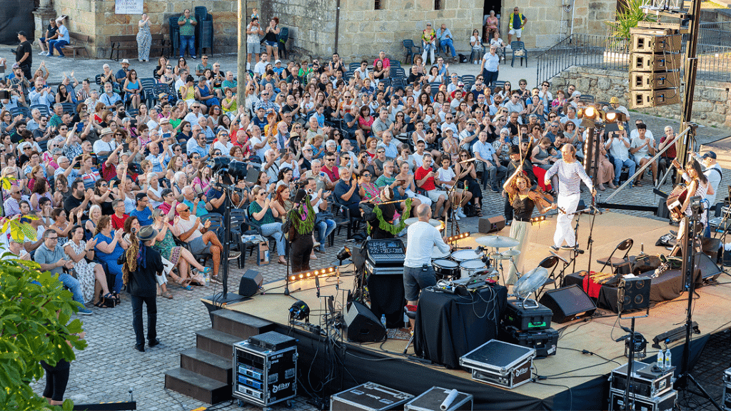 Local musicians performing at a concert that brings a city community together